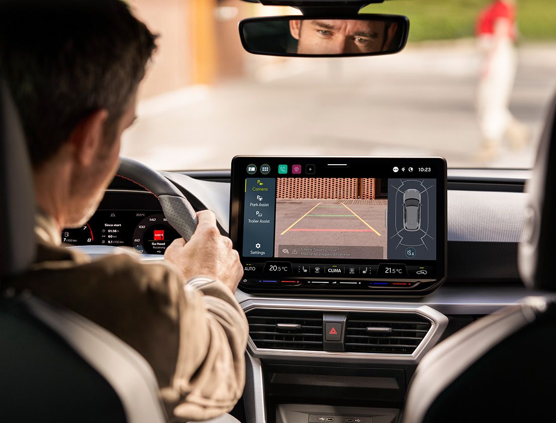 man using park assist with rearview camera